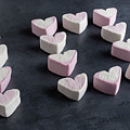 Love heart marshmallows spelling the number ten side view by Scott Lyons