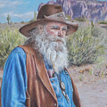 Old Cowboy in Desert Landscape by Melissa Enderle