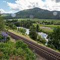 Railway River and Road with Raindrops by Tom Cochran
