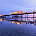 Reflection of the pier at sunset