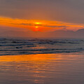Sunset Over Tranquil Ocean Waves