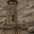 Yaquina Light - Historic Newport Oregon Lighthouse under a dramatic sky by Mike Lee